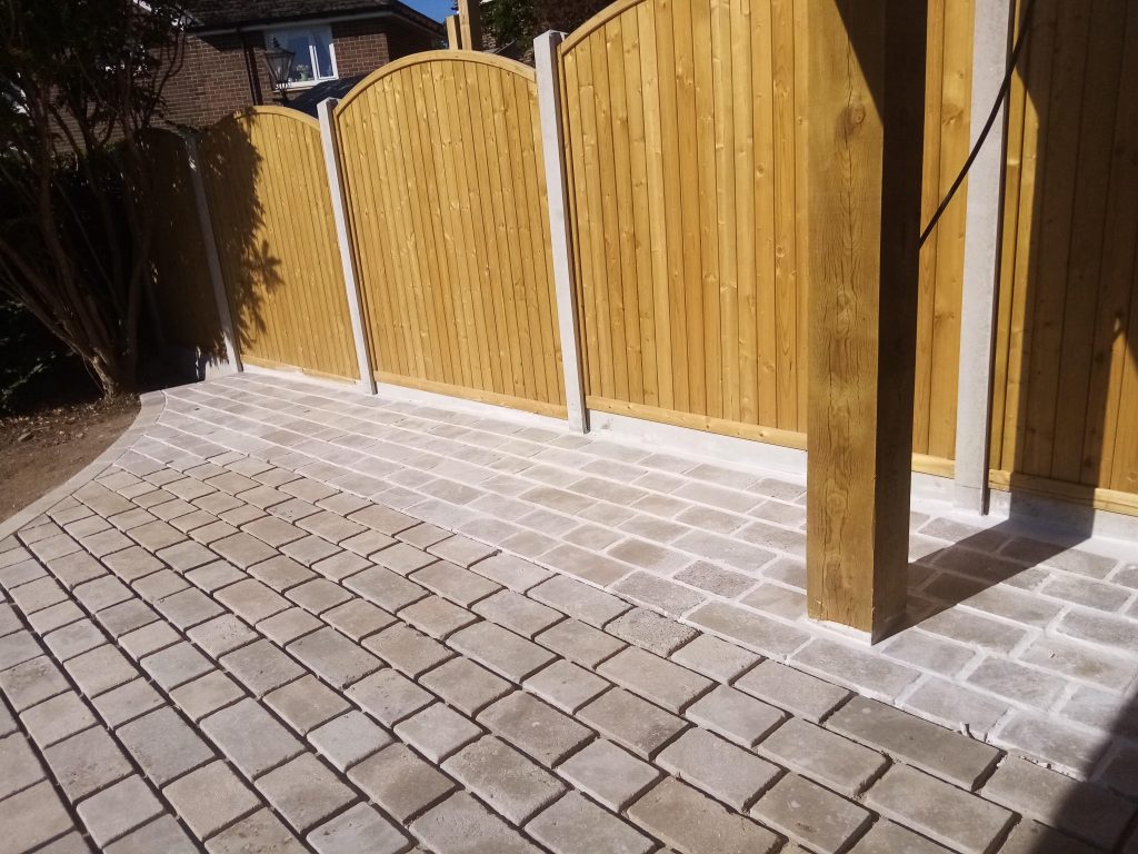 Cobble grouting landscaping excellence in progress in Leeds & West Yorkshire by Strata Stoneworks